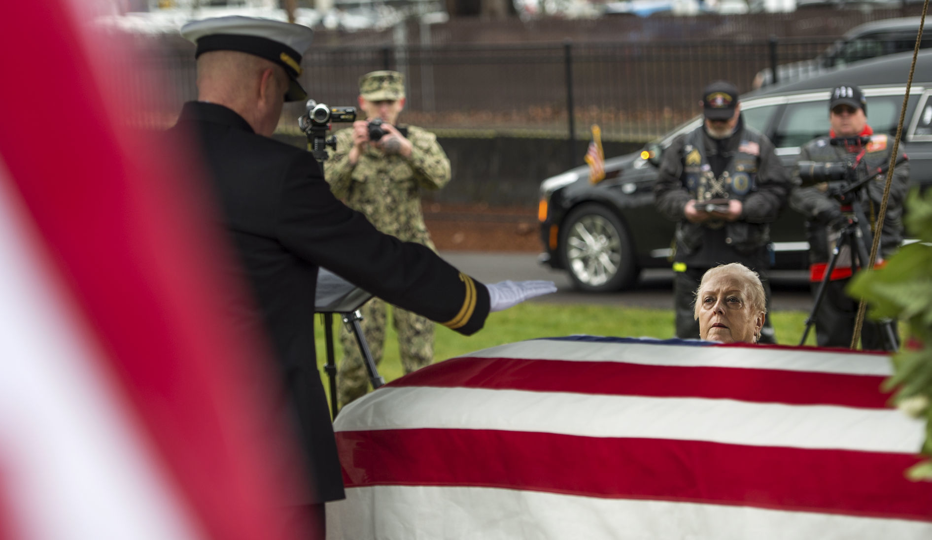 Praying over casket